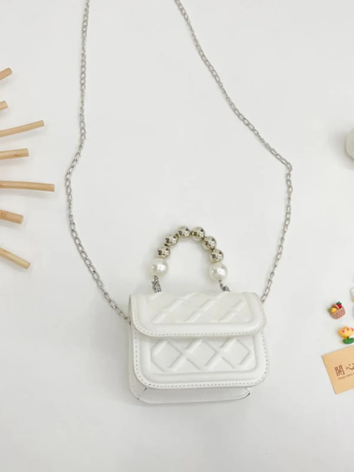 Petite and Polished Pearl-Embellished Quilted Mini Bag