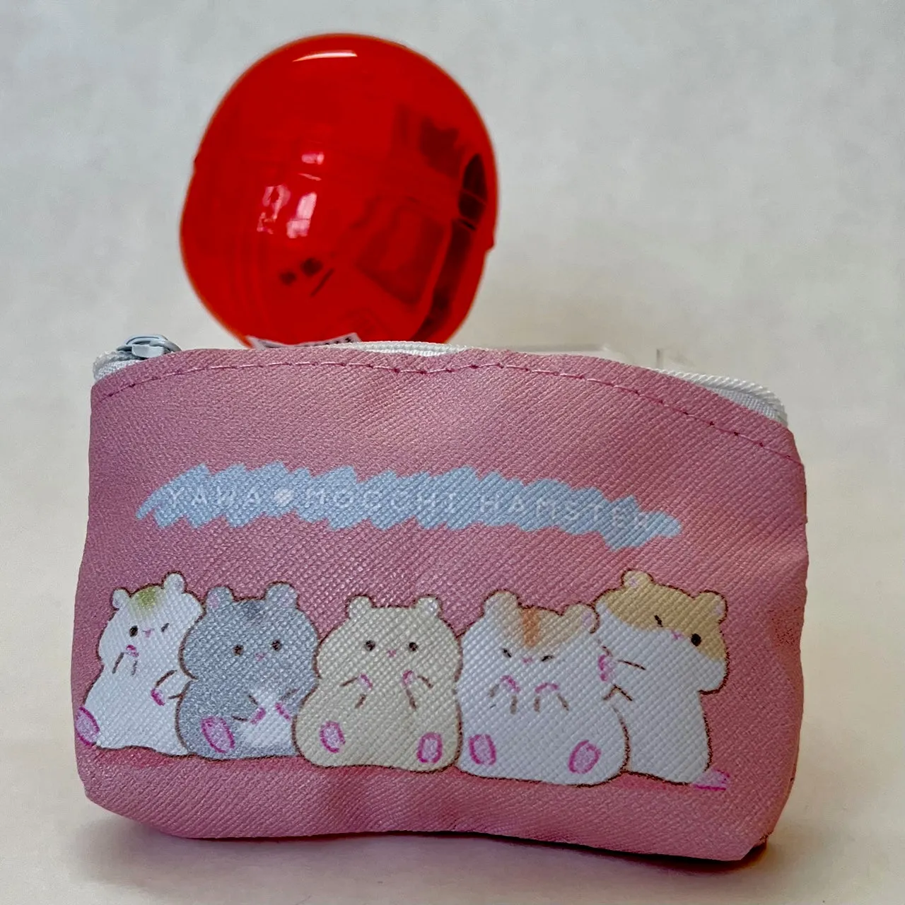 X 70997 Hamster Mini Pouch Capsule-DISCONTINUED