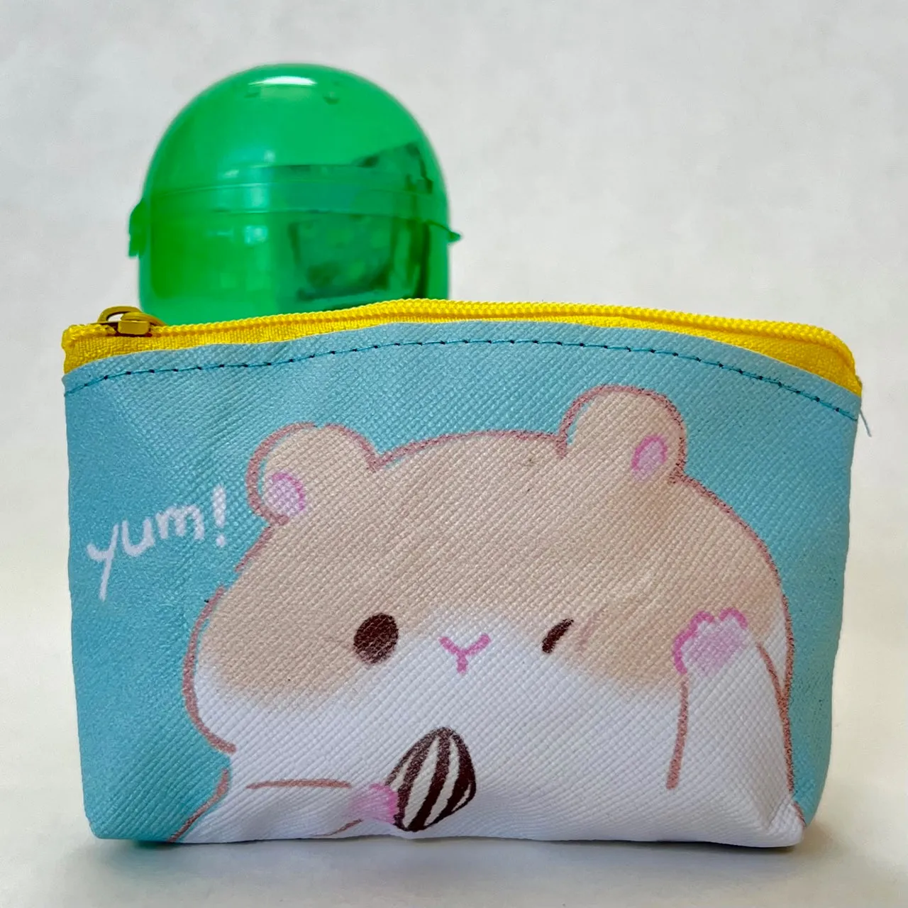 X 70997 Hamster Mini Pouch Capsule-DISCONTINUED